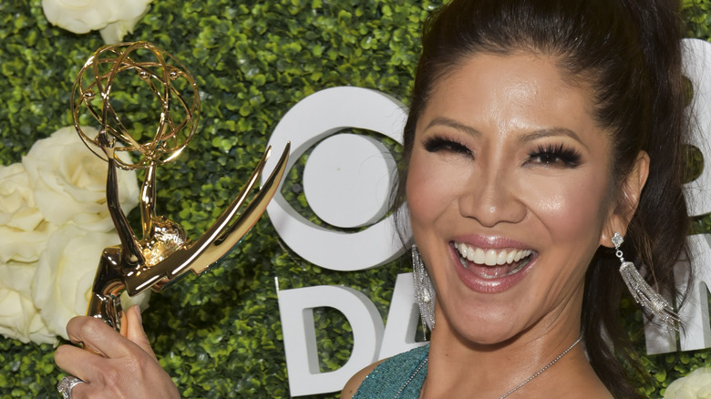 Julie Chen smiling and holding award