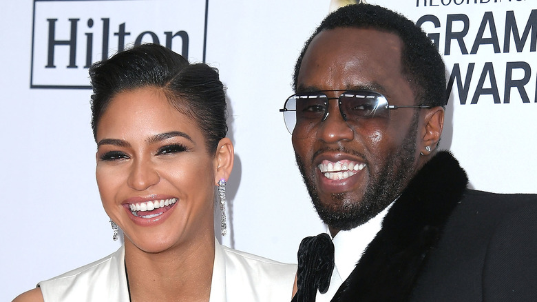 Cassie and Diddy laughing 