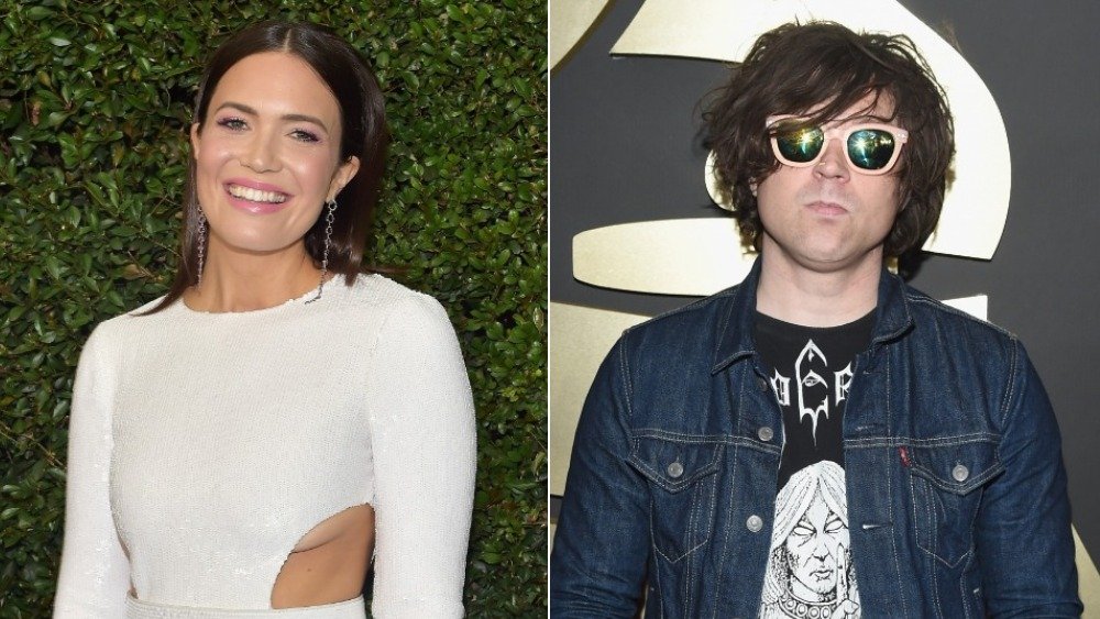 Split image of Mandy Moore in white and smiling, and Ryan Adams in a blue denim jacket and sunglasses with a neutral expression