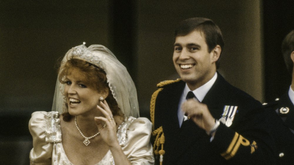 Sarah, Duchess of York and Prince Andrew, Duke of York wave to well-wishers after their wedding, London, England, July 23, 1986.