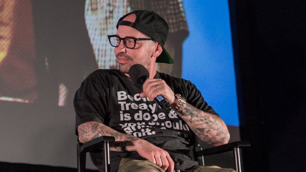 Chauncey Leopardi sitting with microphone on a panel