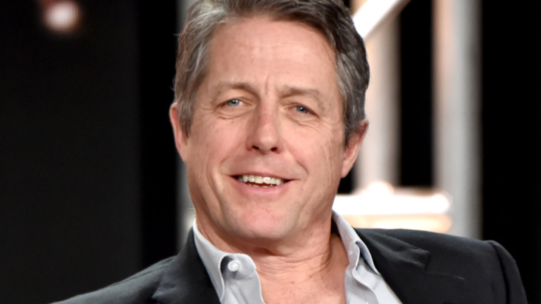 Hugh Grant smiling