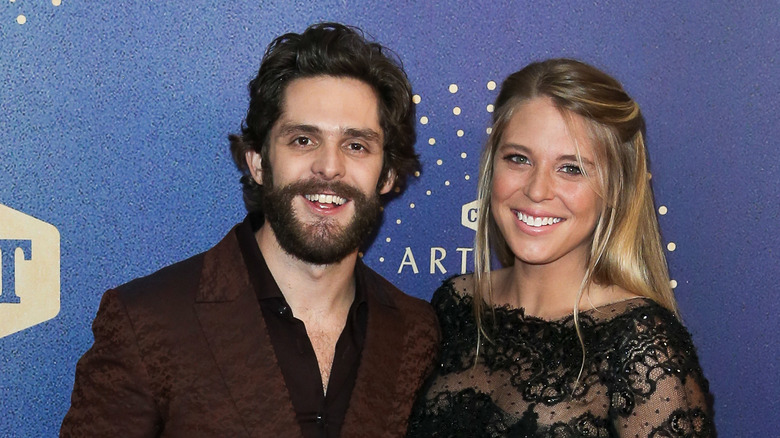 Thomas Rhett and Lauren Akins Smiling on Red Carpet