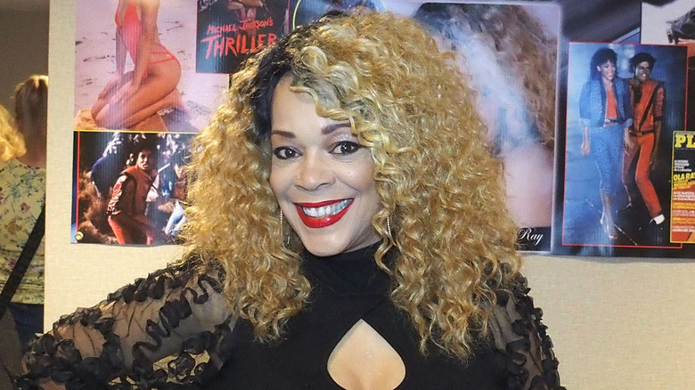 Ola Ray with blond curls