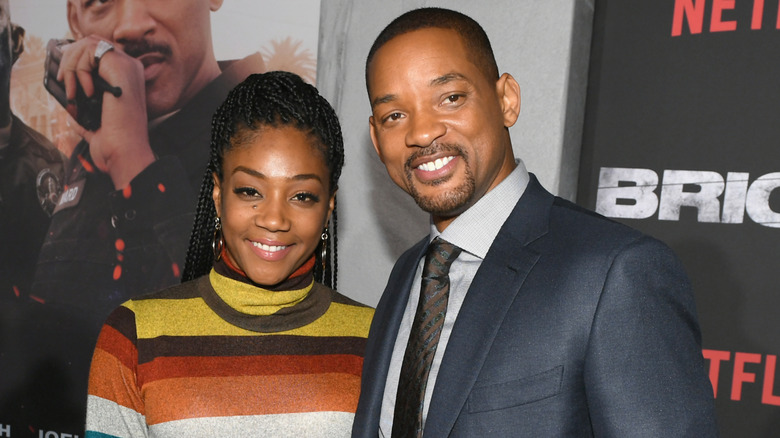 Tiffany Haddish and Will Smith posing together