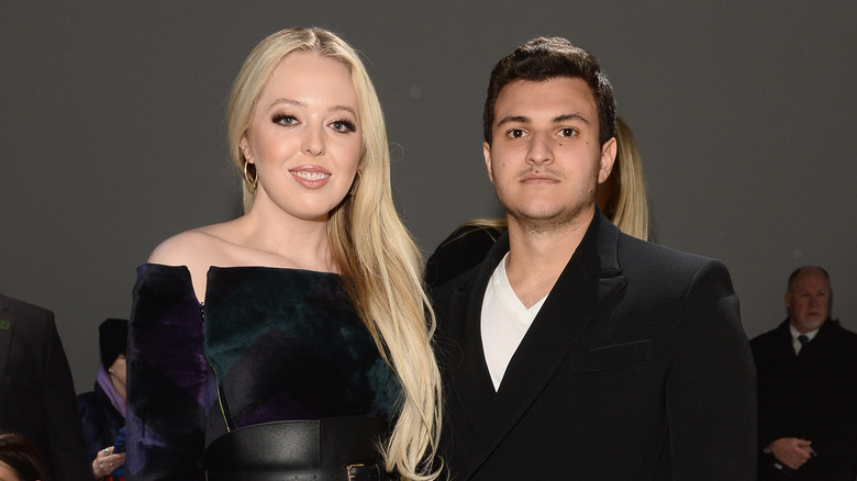 Tiffany Trump and Michael Boulos posing