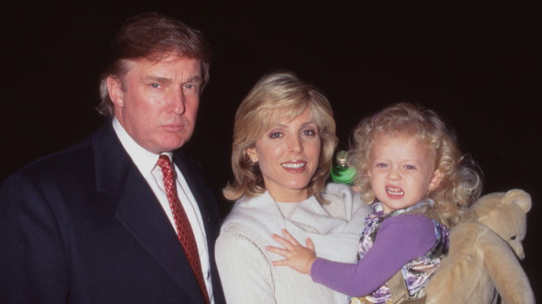 Donald Trump, Marla Maples, and their daughter Tiffany pose together