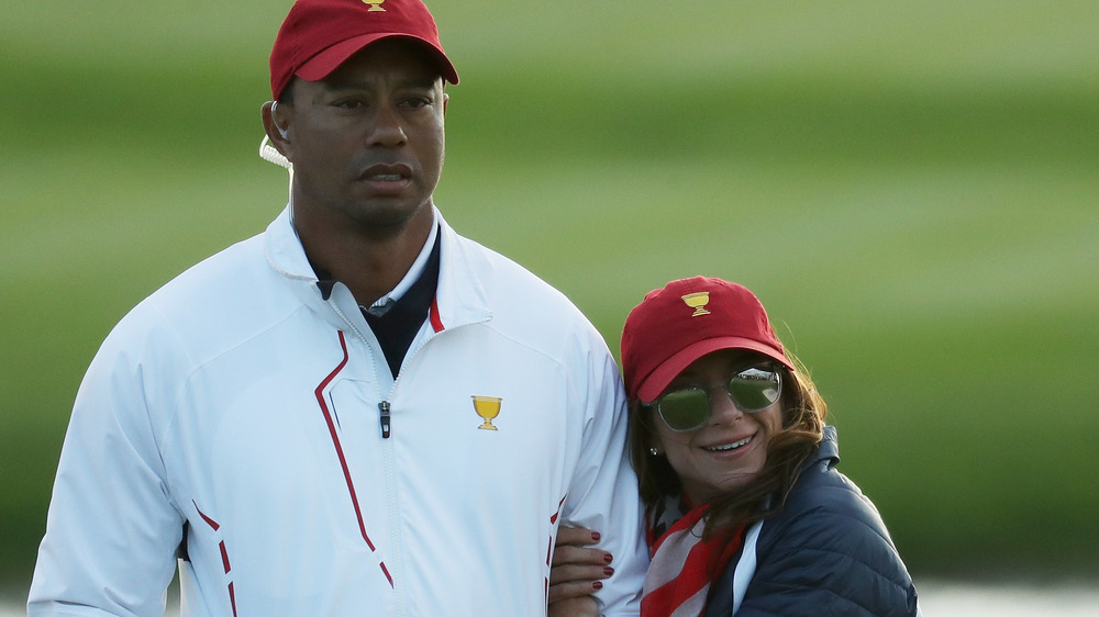 Tiger Woods and Erica Herman on the golf course