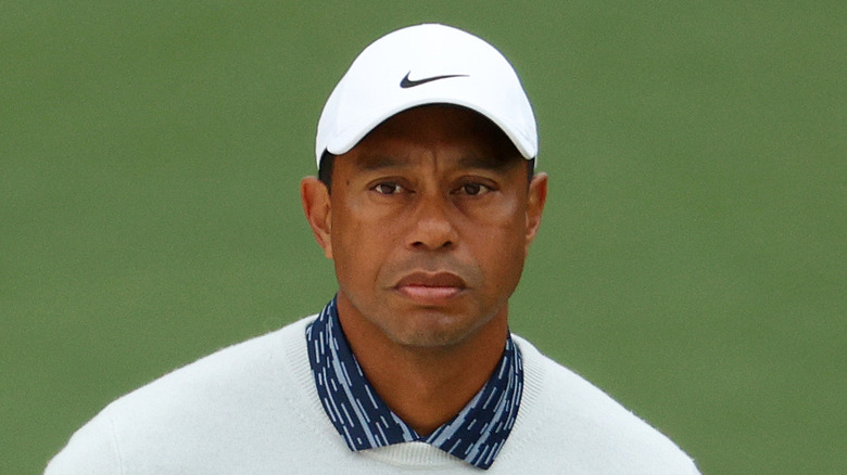 Tiger Woods in a white hat