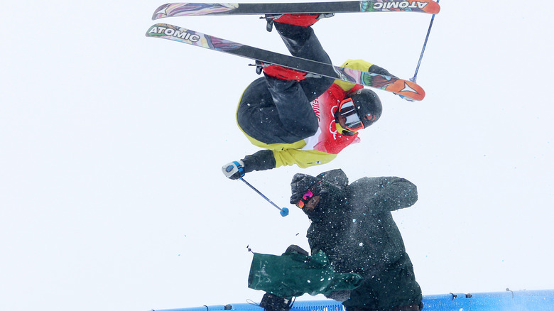  Jon Sallinen skiing mid-air, crashing into cameraman