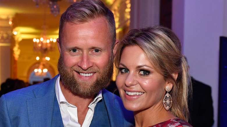 Valeri Bure and Candace Cameron Bure posing together