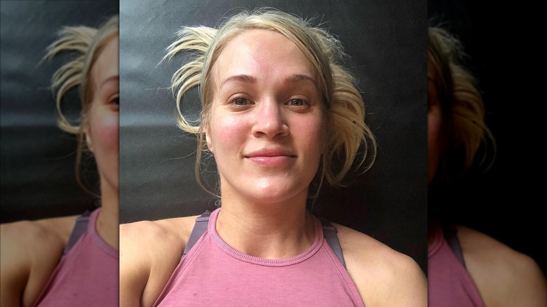 Carrie Underwood with no makeup and pink top