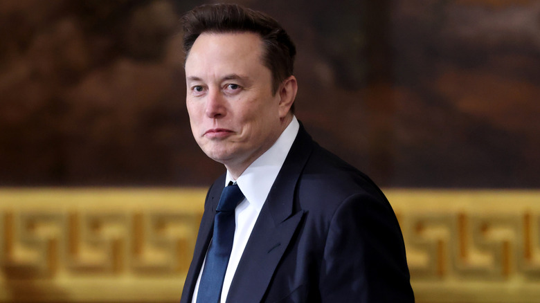 Elon Musk pulling a face