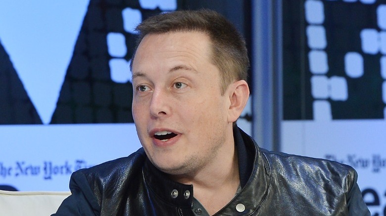 Elon Musk participates in a discussion at the New York Times 2013 DealBook Conference in New York City