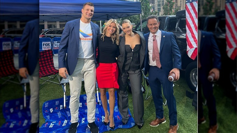 Rob Gronkowski, Ainsley Earhardt, Camille Kostek, and Brian Kilmeade pose for a photo