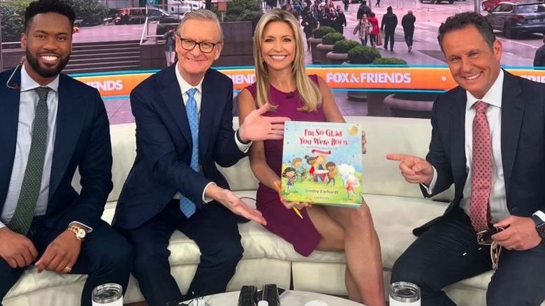 Lawrence Jones, Steve Doocy, Ainsley Earhardt, and Brian Kilmeade on the set of Fox & Friends (2024)