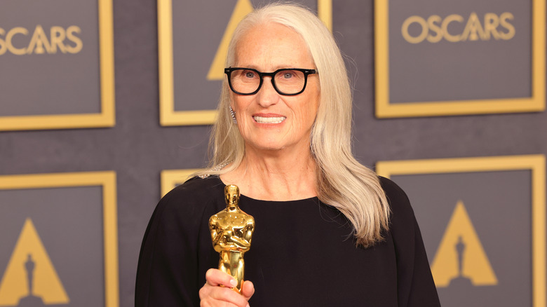 Jane Campion holding Oscar statue