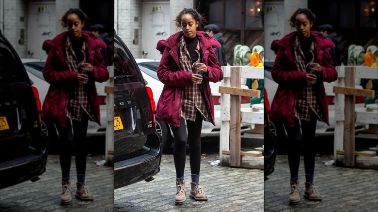 Malia Obama holding water bottle