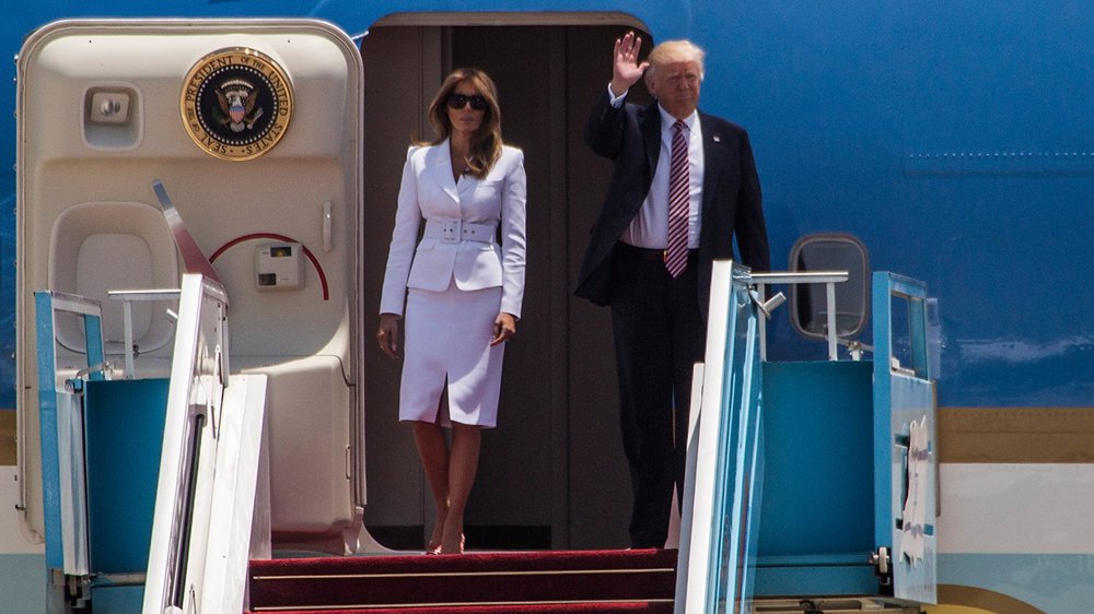 Donald and Melania Trump exit Air Force One