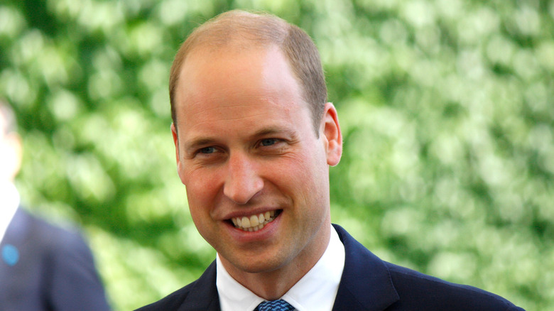 Prince William smiling.