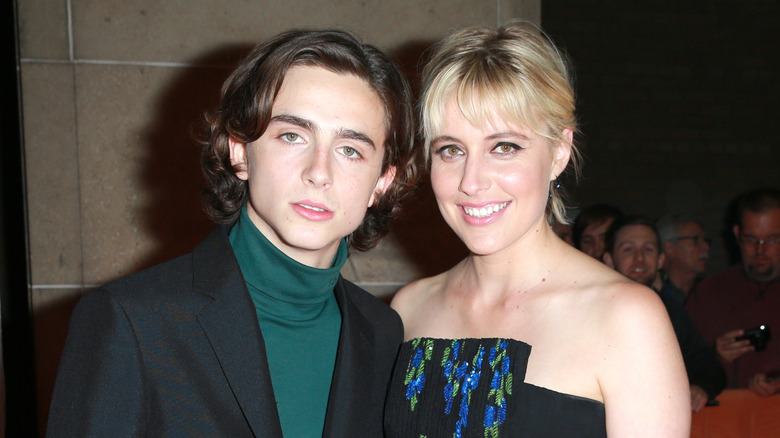 Timothée Chalamet and Greta Gerwig smiling