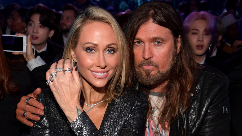 Tish and Billy Ray Cyrus pose together in 2019