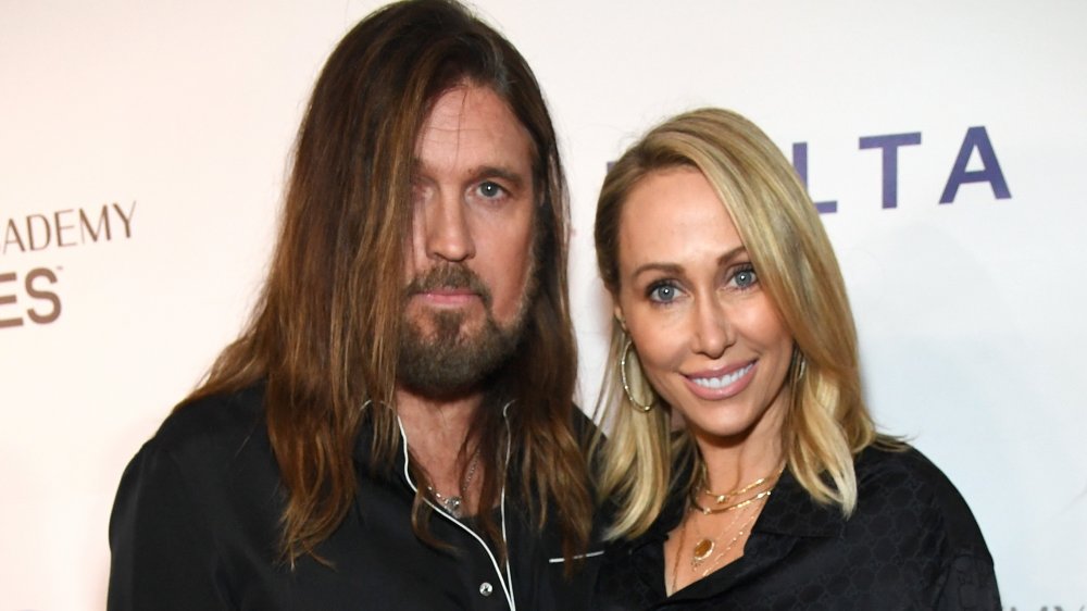 Billy Ray Cyrus and Tish Cyrus posing together