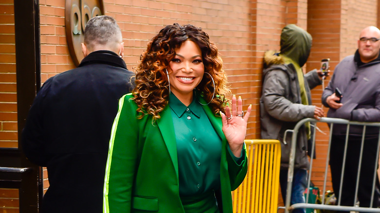 Tisha Campbell green jacket