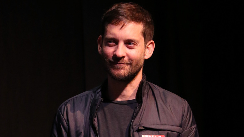 Tobey Maguire black bomber jacket