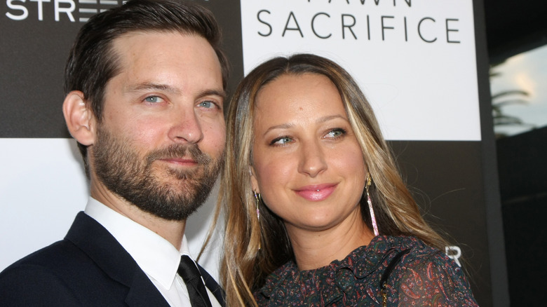 Tobey Maguire and Jennifer Meyer posing