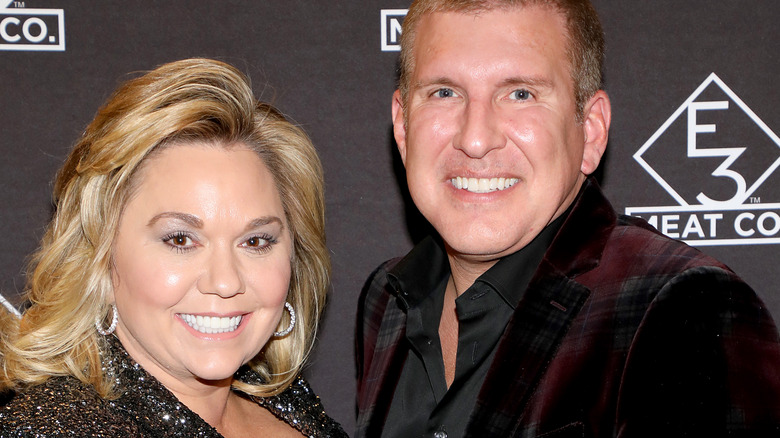 Todd and Julie Chrisley smiling for photo