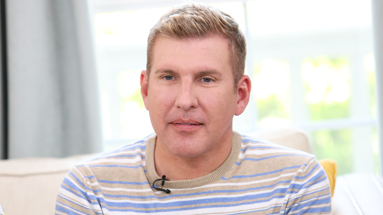 Todd Chrisley wearing striped shirt