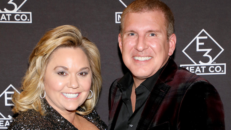  Julie Chrisley (L) and Todd Chrisley attend the grand opening of E3 Chophouse Nashville