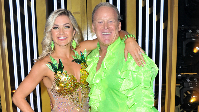 Sean Spicer and Lindsay Arnold posing backstage