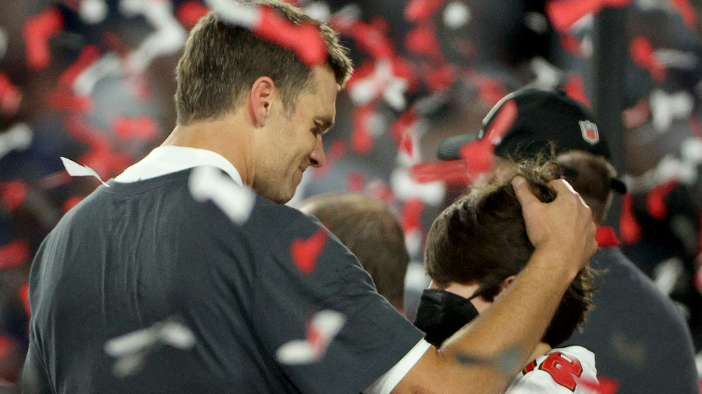 Tom Brady and one of his kids at Super Bowl LV