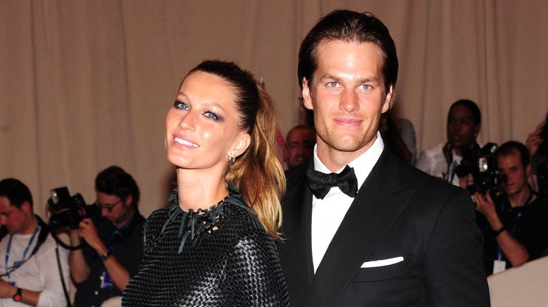 Gisele Bündchen posing with Tom Brady