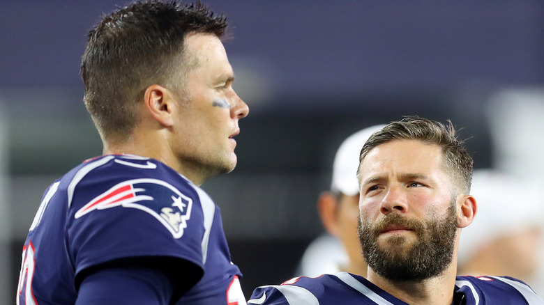 Tom Brady and Julian Edelman on the field