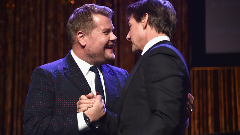 James Corden and Tom Cruise shake hands