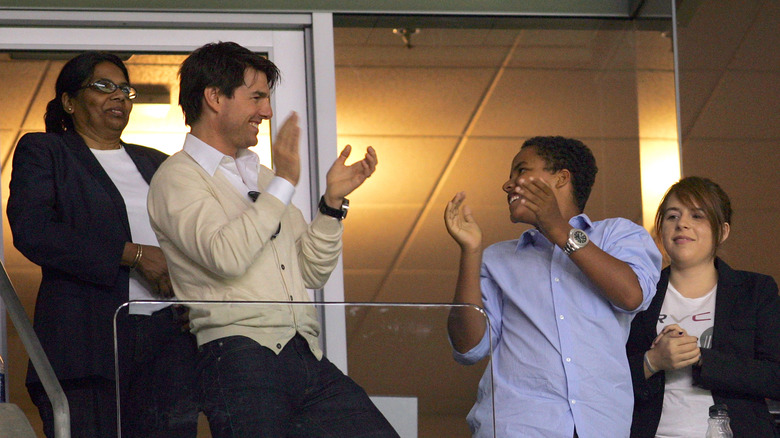 Tom Cruise laughing with Connor and Isabella Cruise