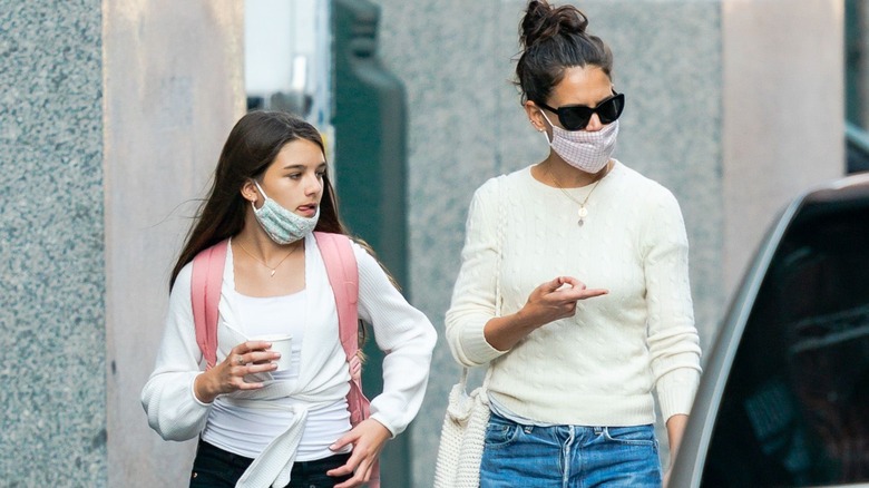 Suri Cruise and Kate Holmes walking