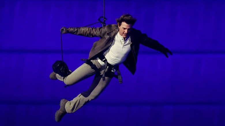 Tom Cruise does a stunt at the 2024 Olympic Games