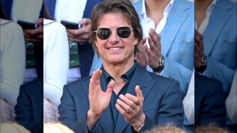 Tom Cruise claps at the 2024 Wimbledon Championships