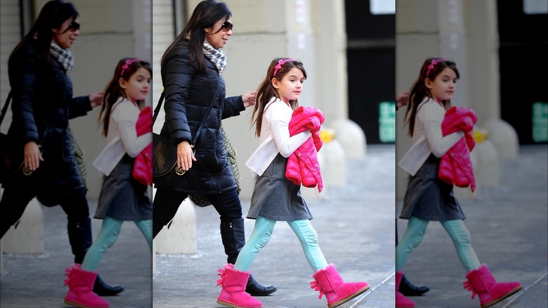 Little Suri Cruise dressed in pink 