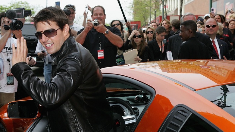 Tom Cruise exits a Saleen Mustang