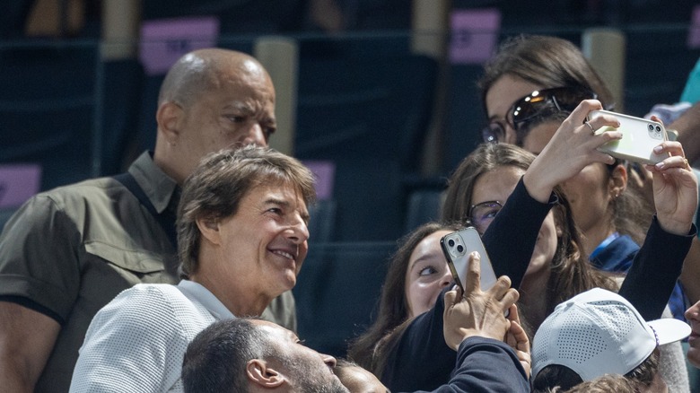 Tom Cruise takes selfie with fans