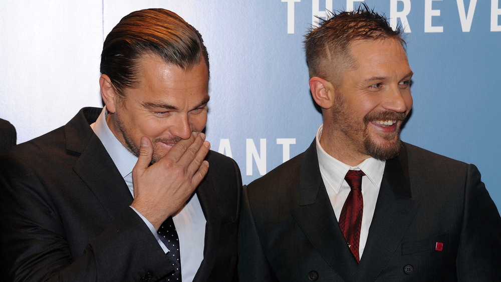 Tom Hardy and Leonardo DiCaprio laughing