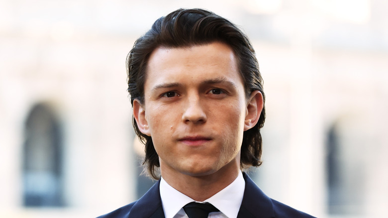 Tom Holland not smiling with longer hair