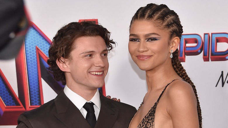 tom holland looking at zendaya