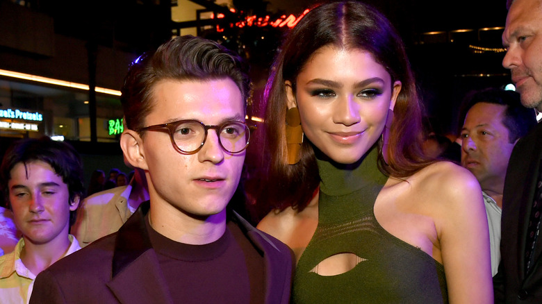 Tom Holland and Zendaya posing