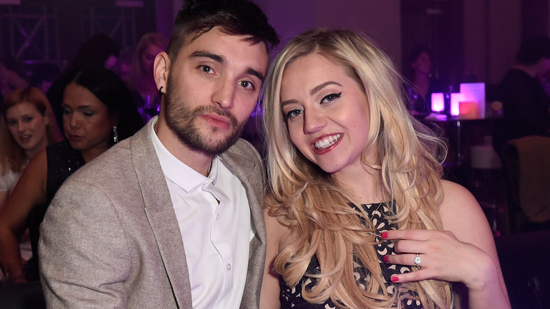 Tom Parker and Kelsey Parker posing